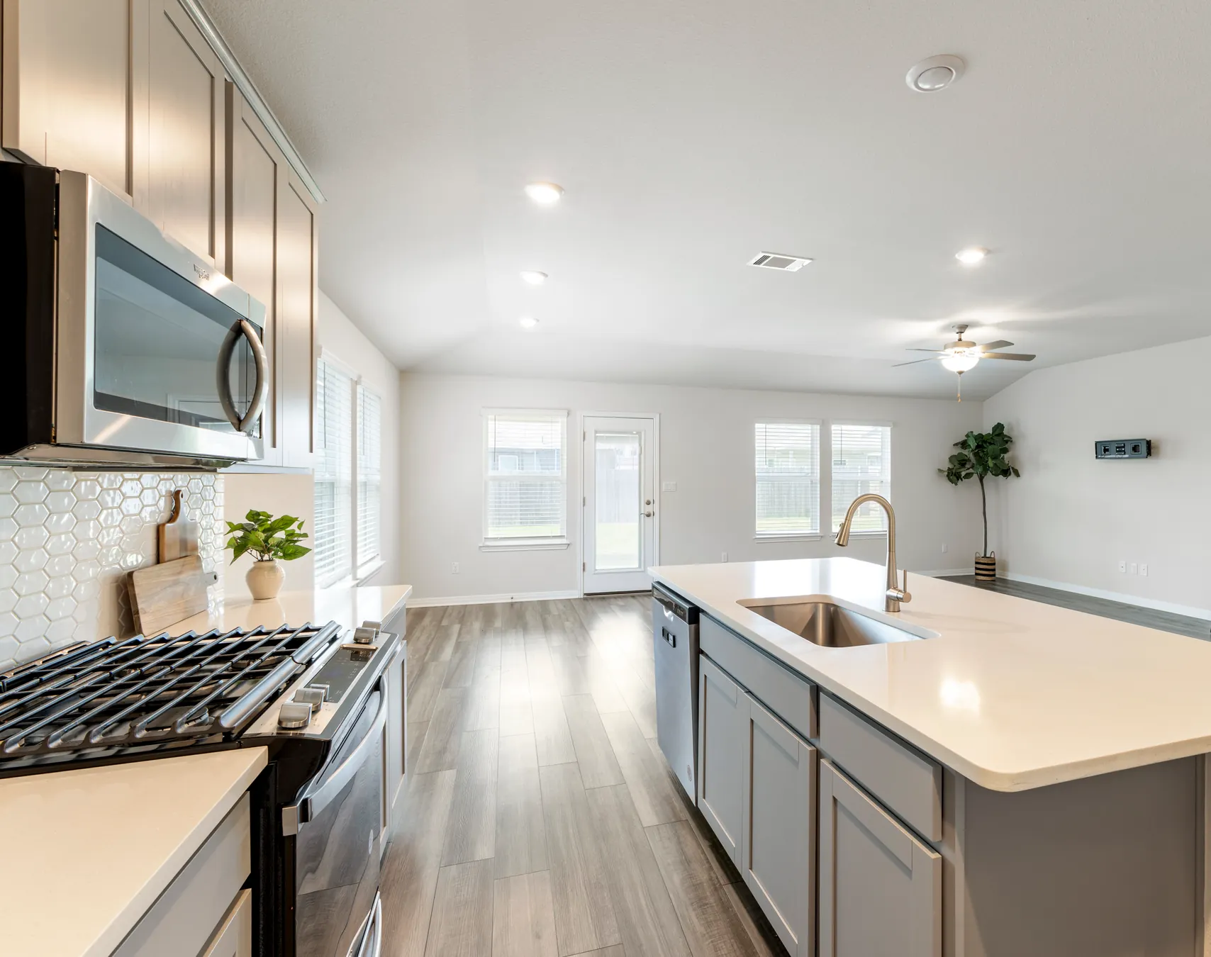 Open kitchen and living area at 613 Wildspur Dr